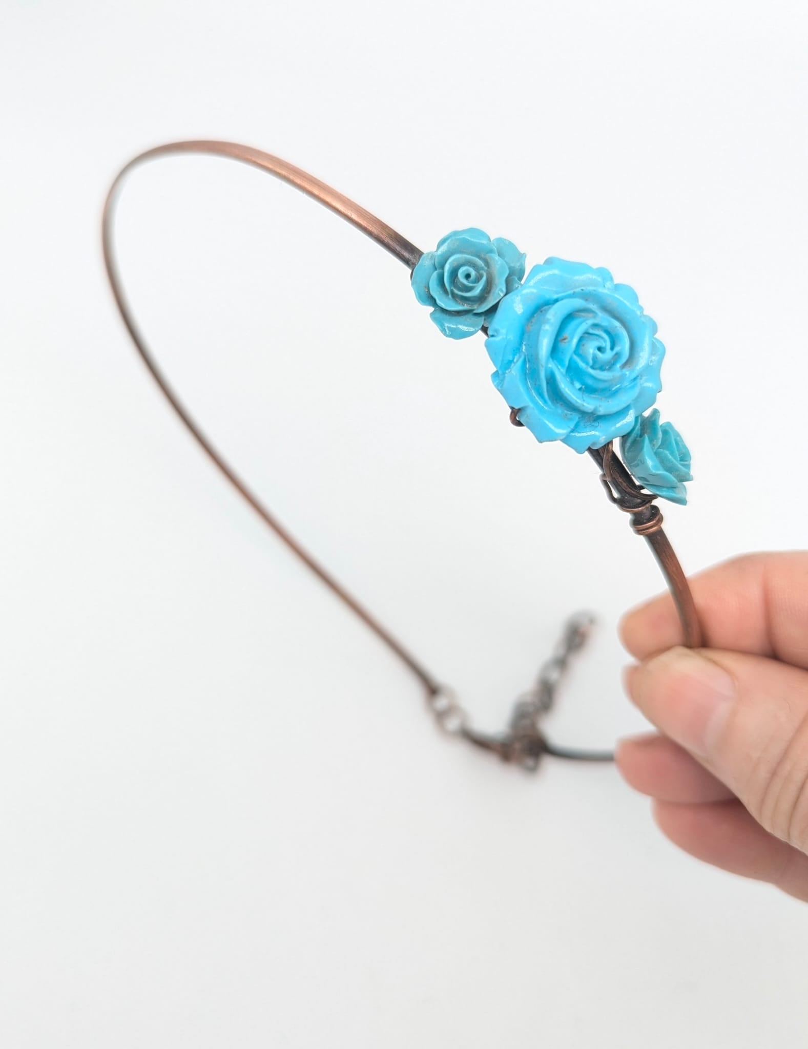 Copper Hair band with three resin cast turquoise roses