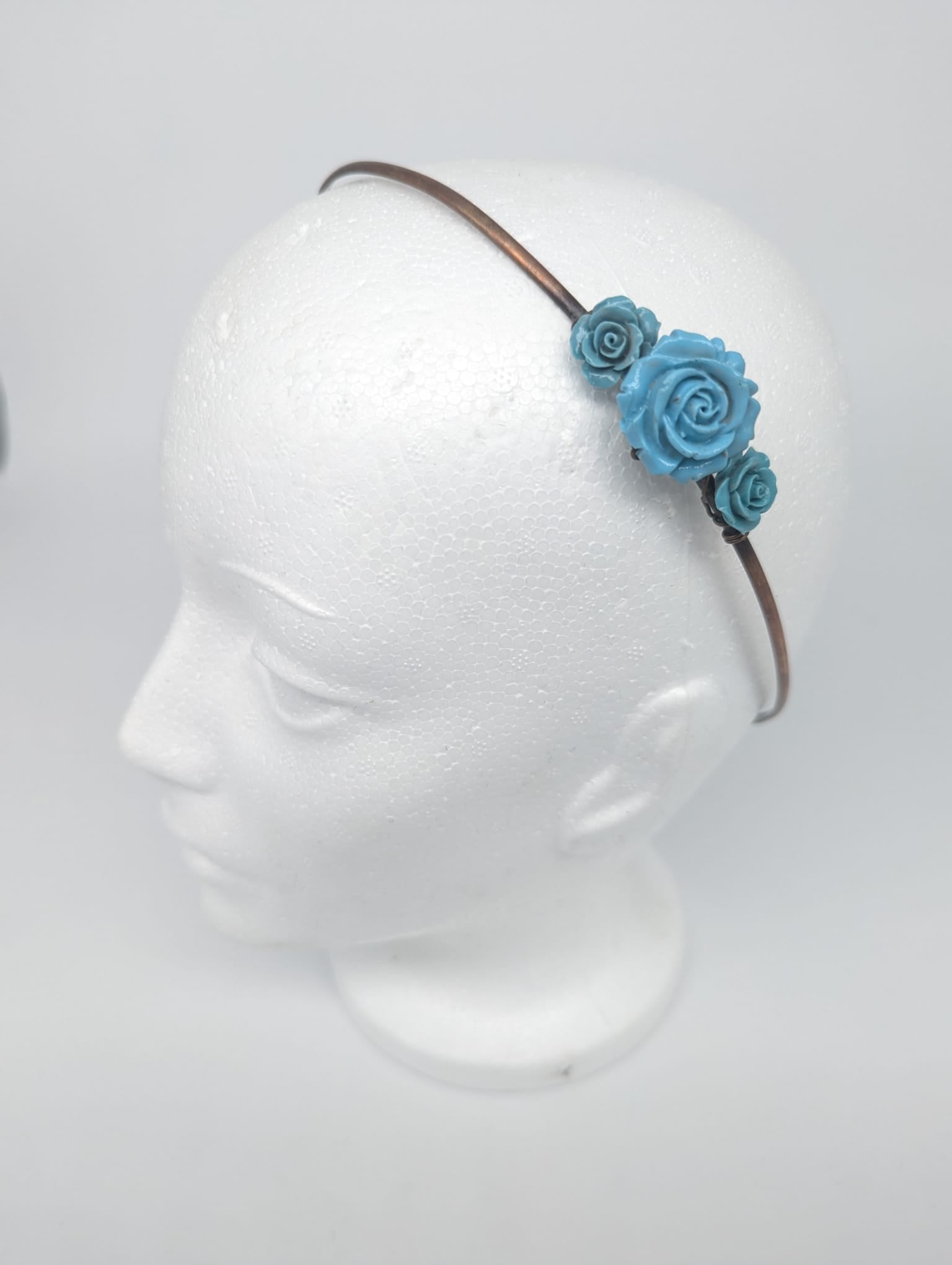Copper Hair band with three resin cast turquoise roses