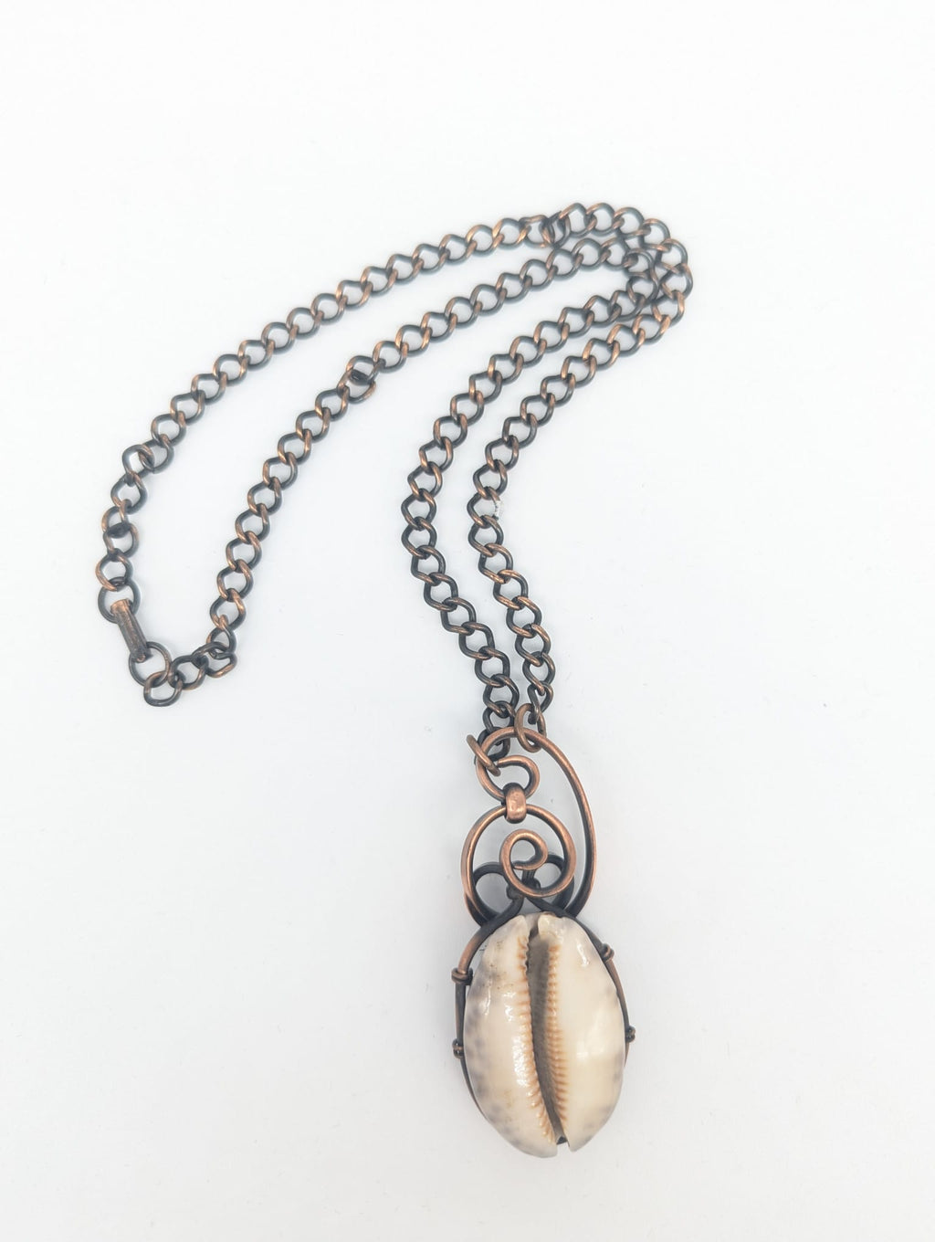 Cowrie Shell copper wrapped pendan